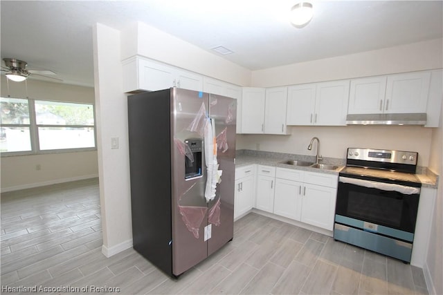 kitchen featuring ceiling fan, white cabinetry, sink, and appliances with stainless steel finishes