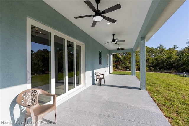 view of patio featuring a ceiling fan