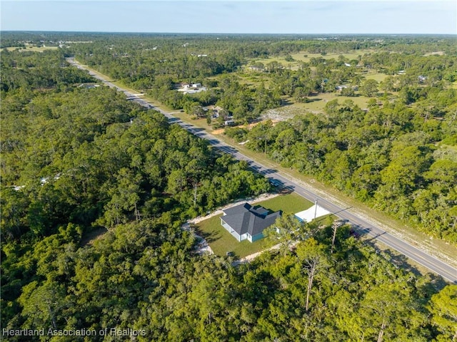 bird's eye view featuring a view of trees