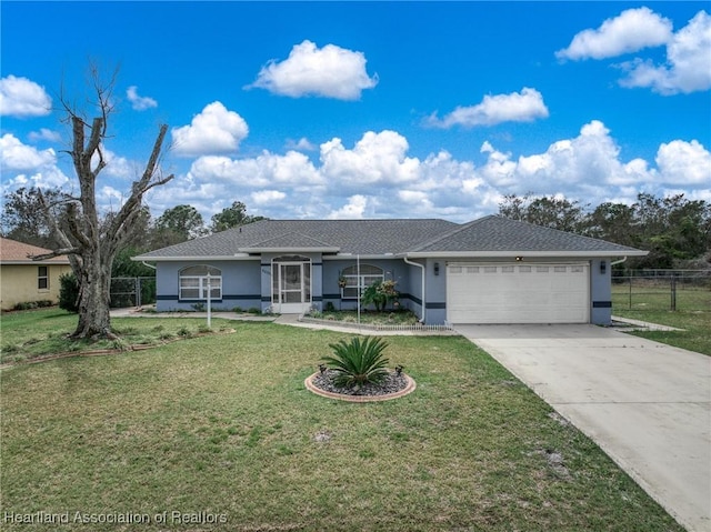 ranch-style house with a garage and a front lawn