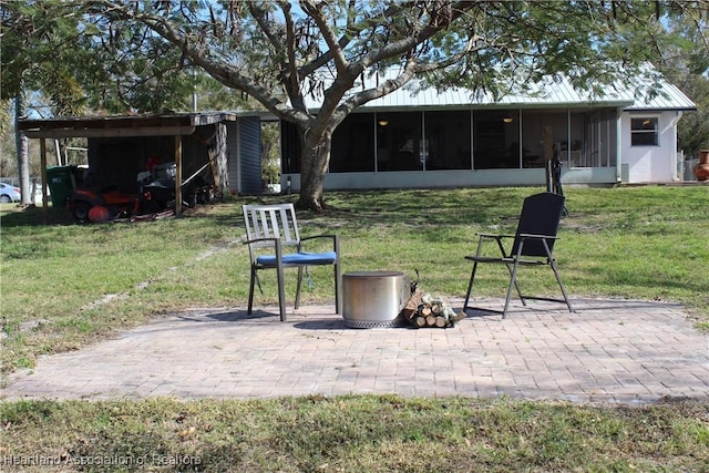 view of yard with a patio and a sunroom