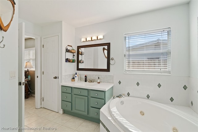 bathroom with vanity, a tub to relax in, and tile patterned floors