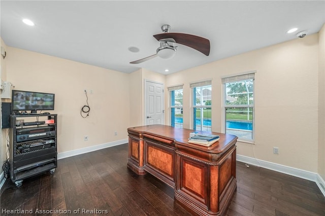 office with ceiling fan and dark hardwood / wood-style floors