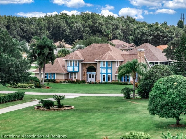 view of front facade with a front lawn