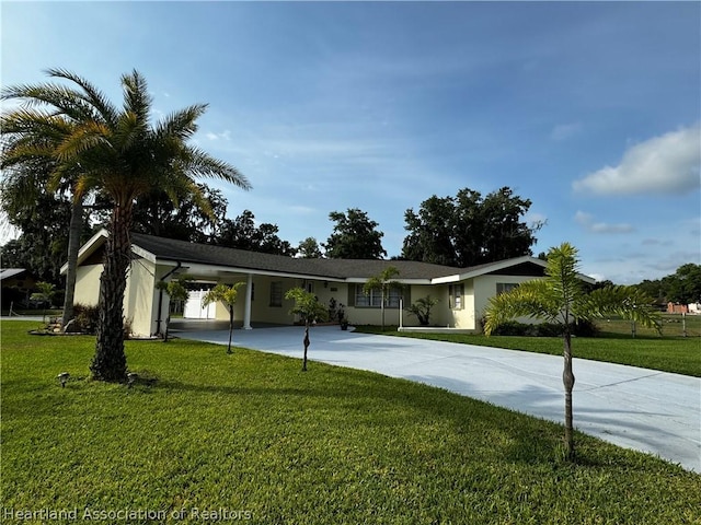 single story home with a carport and a front lawn