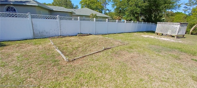 view of yard featuring fence