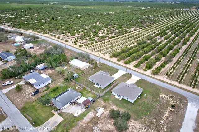 birds eye view of property featuring a rural view