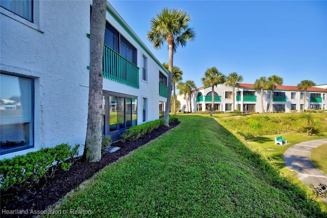 view of yard featuring a residential view