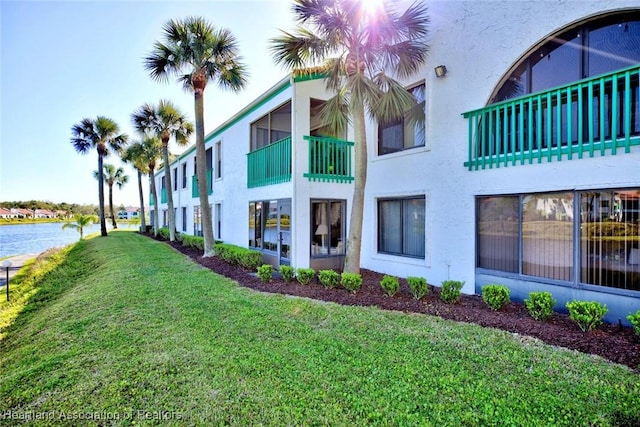 exterior space with a water view