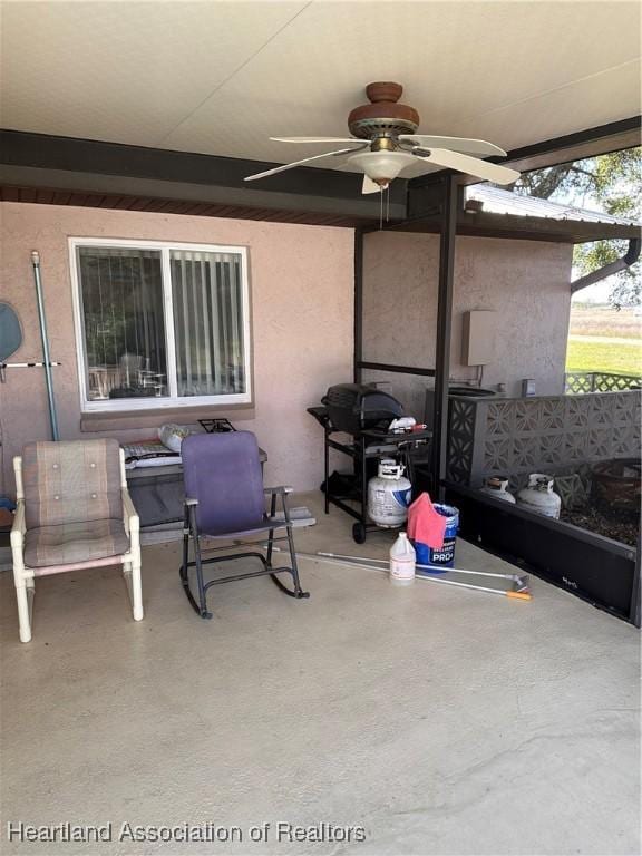 view of patio with ceiling fan