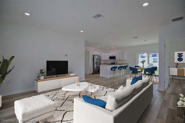 living room featuring hardwood / wood-style flooring