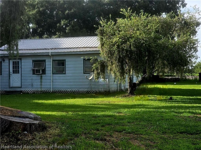 exterior space with a lawn