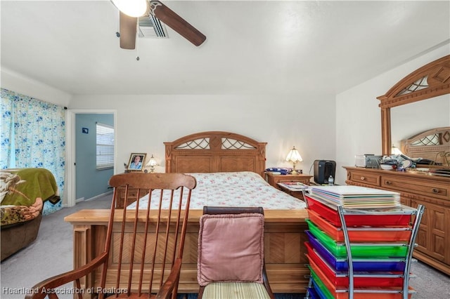 bedroom with ceiling fan and light colored carpet