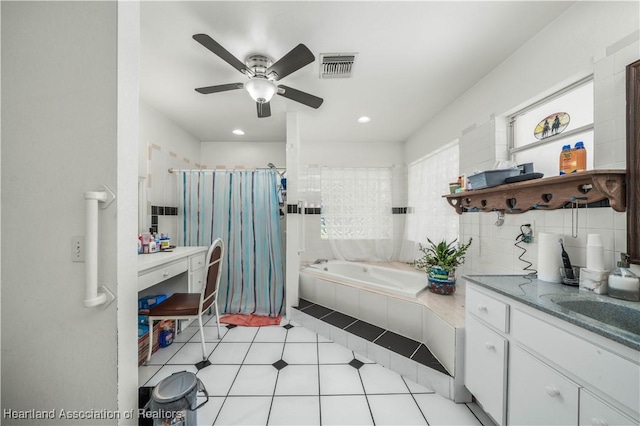 bathroom with tile patterned floors, separate shower and tub, vanity, ceiling fan, and backsplash