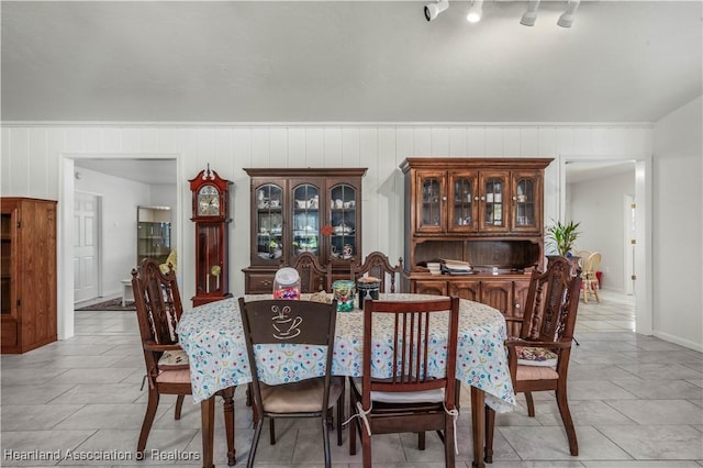 dining area with light tile patterned floors