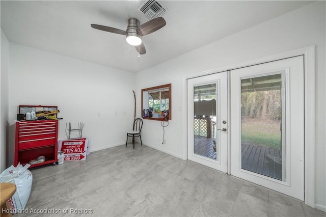 interior space with plenty of natural light, ceiling fan, and french doors