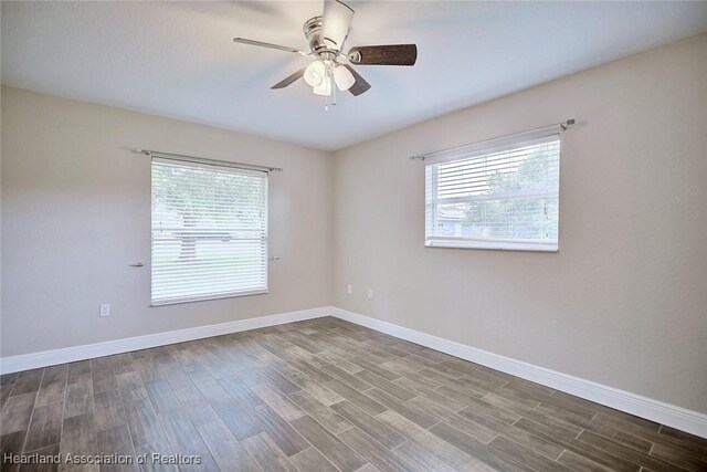 1465 Berwin Ave, Avon Park, FL 33825 - empty room with plenty of natural light, wood finished floors, and a ceiling fan