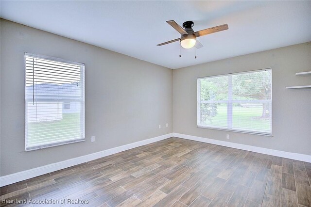 1465 Berwin Ave, Avon Park, FL 33825 - empty room with ceiling fan and wood finished floors