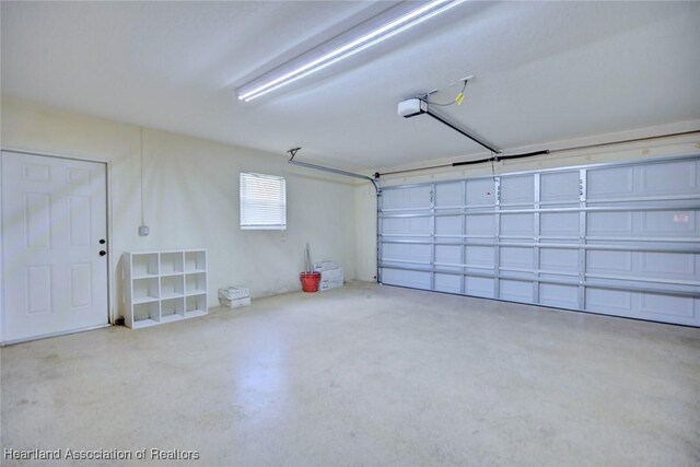 1465 Berwin Ave, Avon Park, FL 33825 - garage featuring a garage door opener