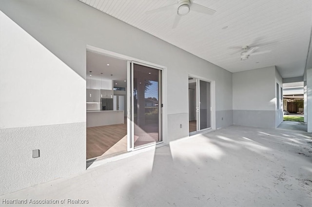 view of patio with ceiling fan