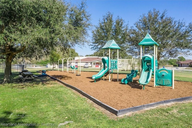 view of play area with a yard