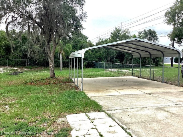 136 Hallmark Ave, Lake Placid, FL 33852 - view of parking / parking lot with a detached carport and driveway