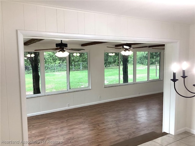 136 Hallmark Ave, Lake Placid, FL 33852 - unfurnished room with ceiling fan, plenty of natural light, and wood finished floors
