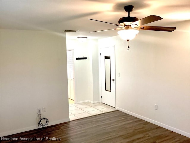 136 Hallmark Ave, Lake Placid, FL 33852 - unfurnished room featuring light wood finished floors, a ceiling fan, and baseboards