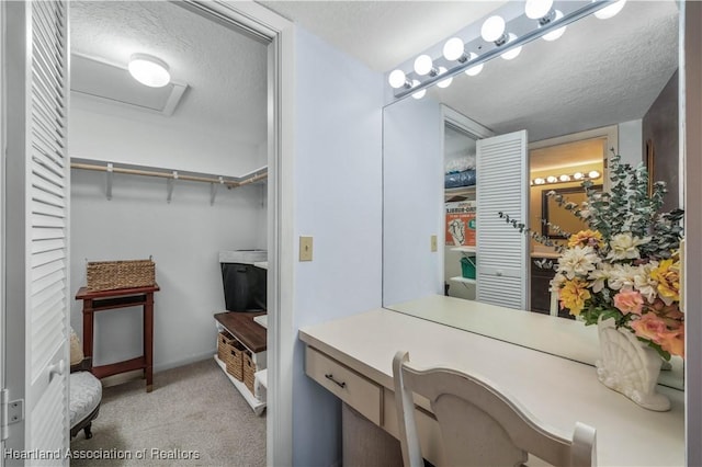 bathroom featuring vanity and a textured ceiling