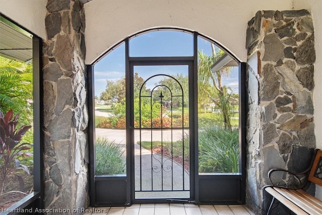 entryway featuring light tile patterned floors