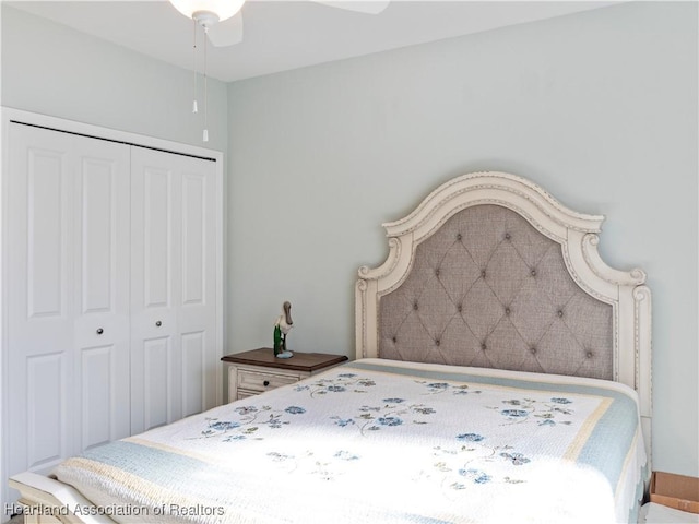 bedroom featuring a closet and ceiling fan