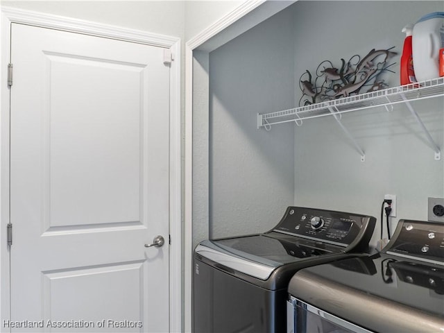 washroom featuring separate washer and dryer