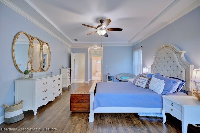 bedroom featuring ceiling fan, ornamental molding, dark wood-style flooring, and visible vents