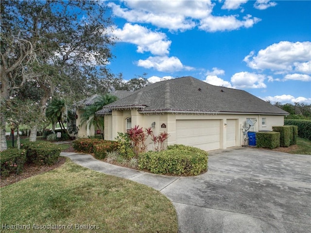 view of side of home with a garage