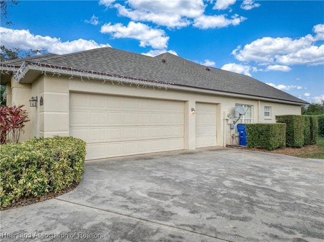 view of property exterior with a garage