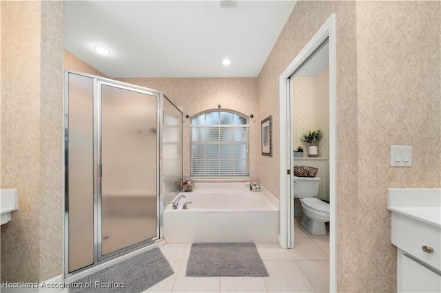 full bathroom with tile patterned flooring, vanity, toilet, and independent shower and bath