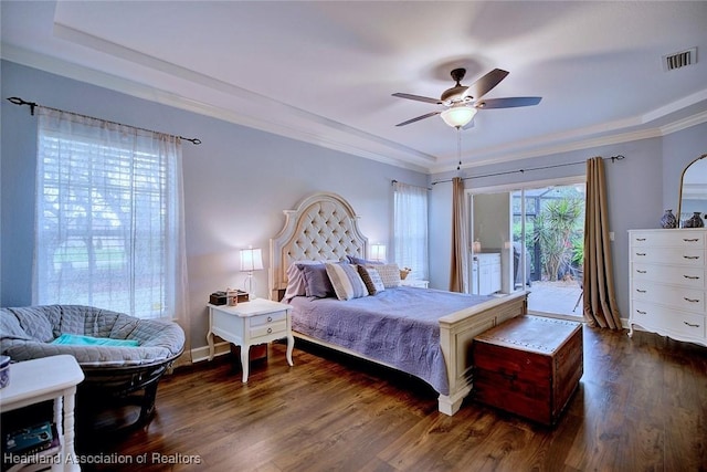 bedroom with access to exterior, crown molding, visible vents, and dark wood-style flooring