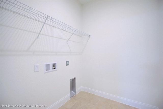 clothes washing area with hookup for a washing machine and hookup for an electric dryer