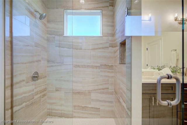 bathroom featuring vanity and walk in shower