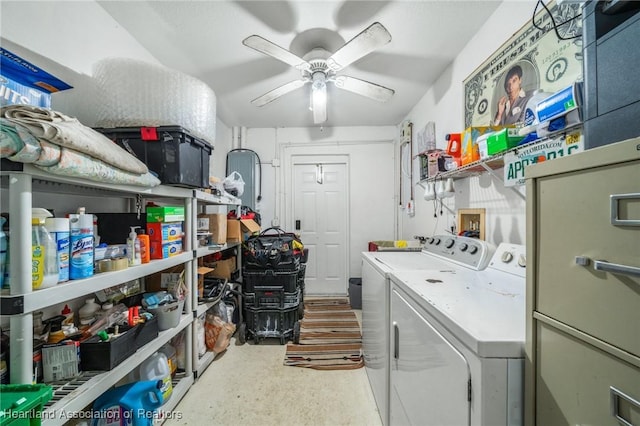 washroom with laundry area, washing machine and dryer, and a ceiling fan