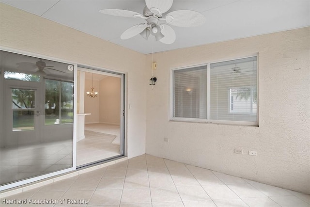 interior space featuring ceiling fan