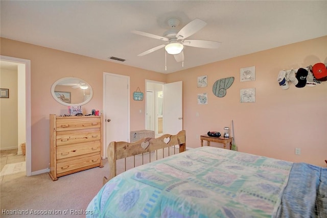 carpeted bedroom with ceiling fan