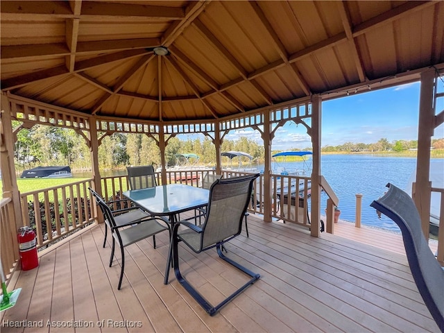 dock area with a gazebo and a water view