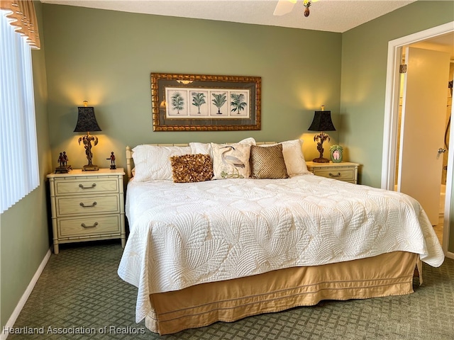 carpeted bedroom with ceiling fan