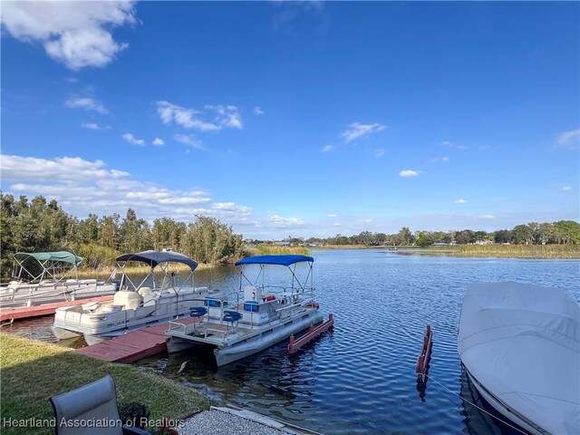 view of dock with a water view