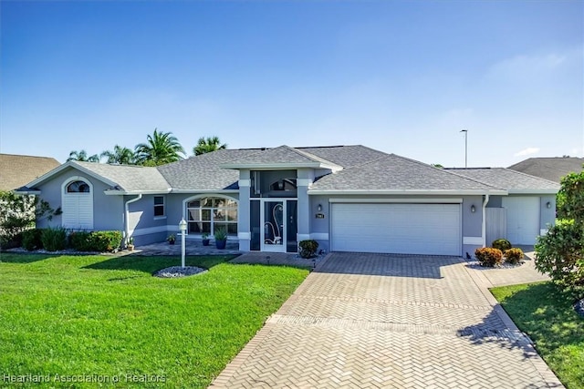 ranch-style house with a garage and a front yard