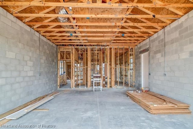 misc room featuring unfinished concrete floors