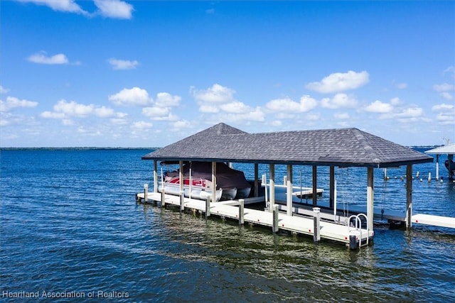 dock area featuring a water view