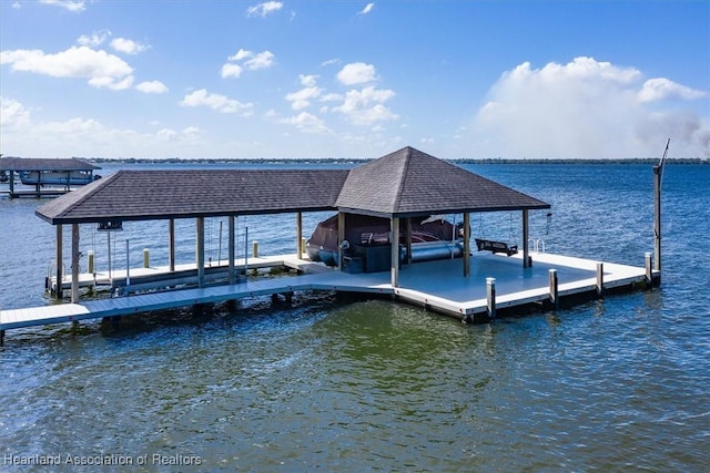 dock area featuring a water view