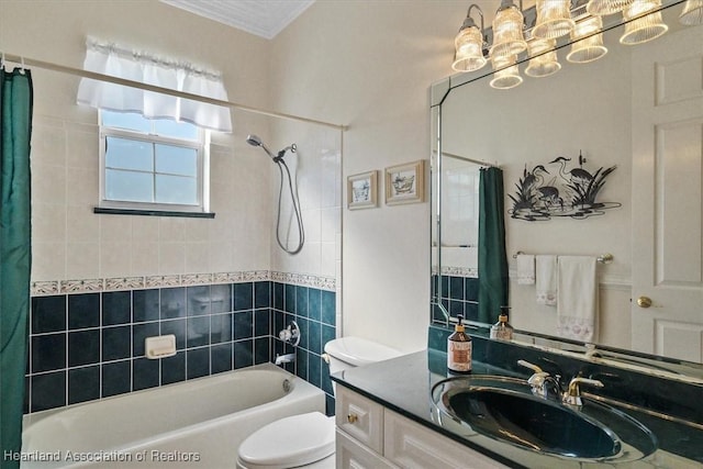 full bathroom featuring shower / bath combo with shower curtain, vanity, and toilet